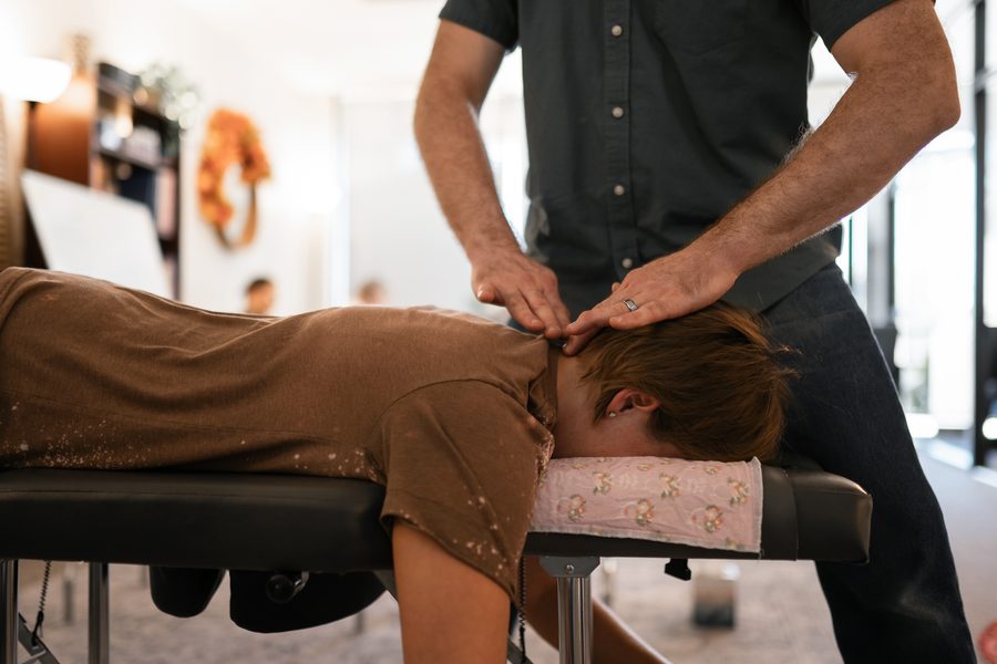 Gentle contact at the base of the neck